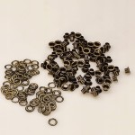 Oczka Polskie metalowe kaletnicze 4 / 7,5 / 4 mm stare złoto 100 sztuk