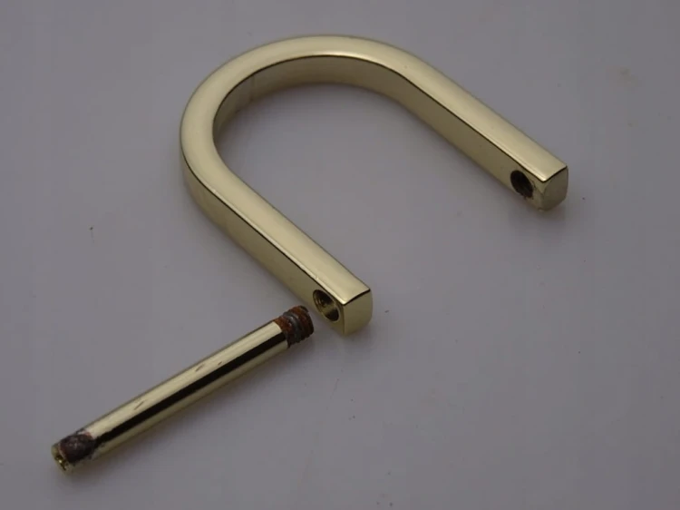 Półkole kaletnicze szlufka skręcana 20 mm złote